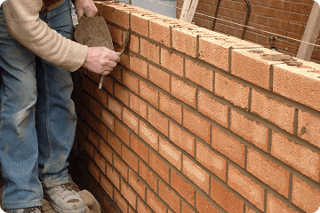 Brick wall demolishing work